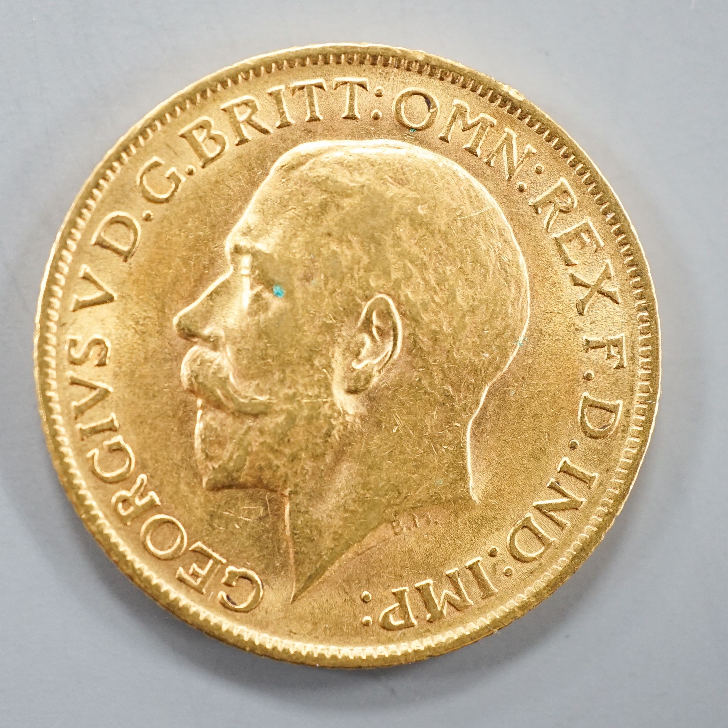 A George V 1913 gold sovereign.